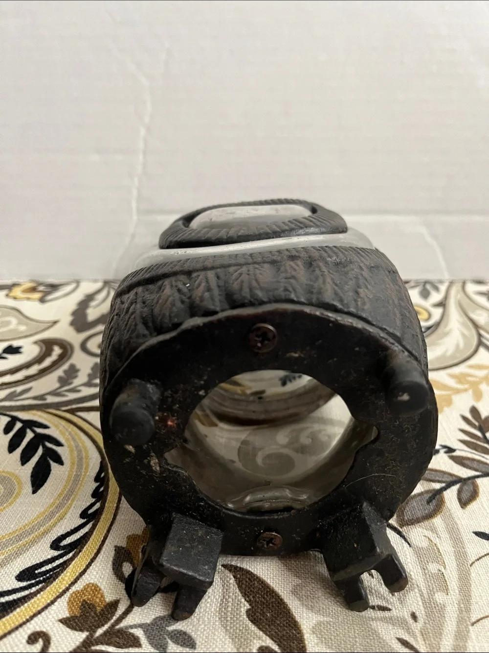Cast iron owl candle holder lantern with hand blown glass.